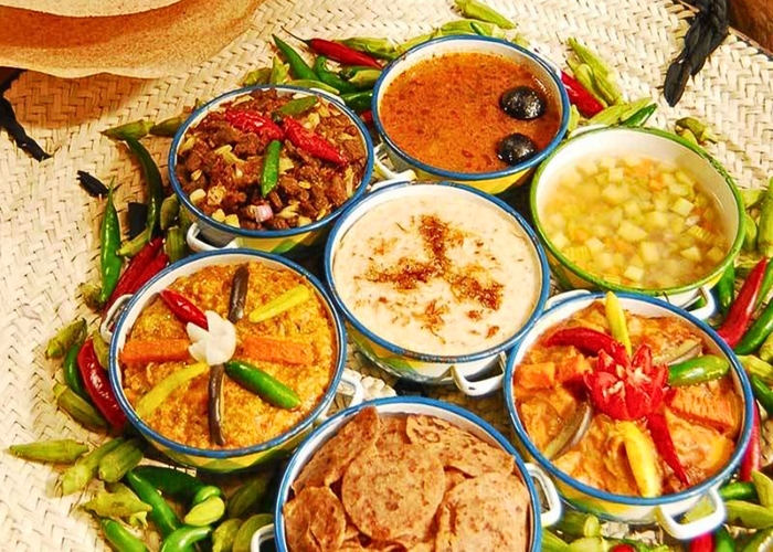 Trải nghiệm và thưởng thức ẩm thực tại các chợ châu Phi. Ảnh: Du lịch Phượng Hoàng